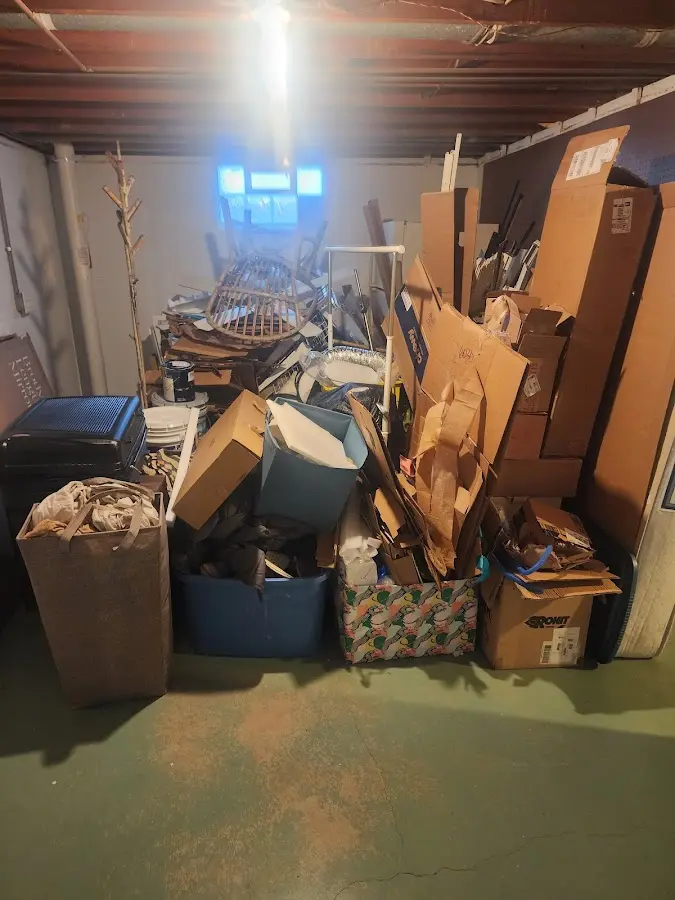 Roll-off dumpster container at job site for Yard Waste Dumpster Rental in Minden